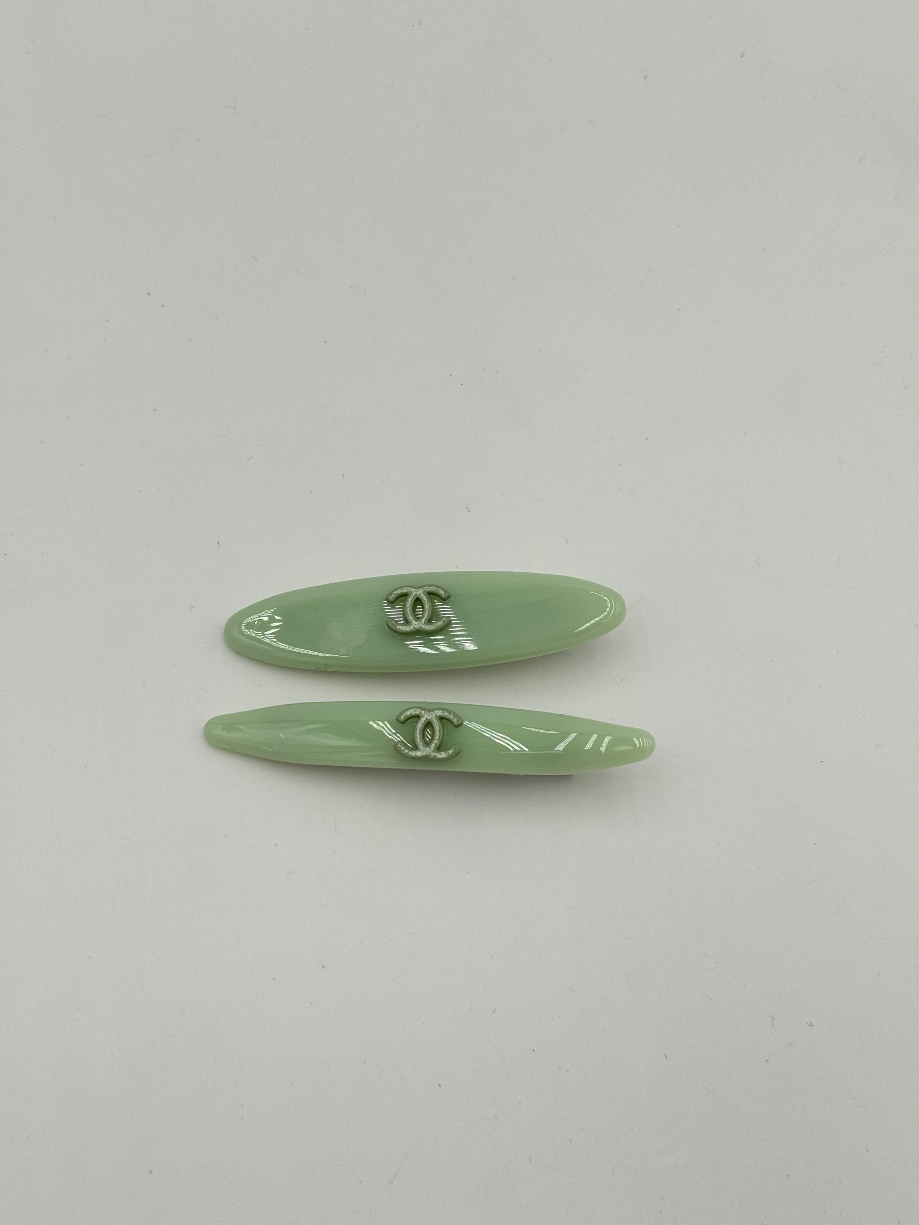 Coppia clip verde