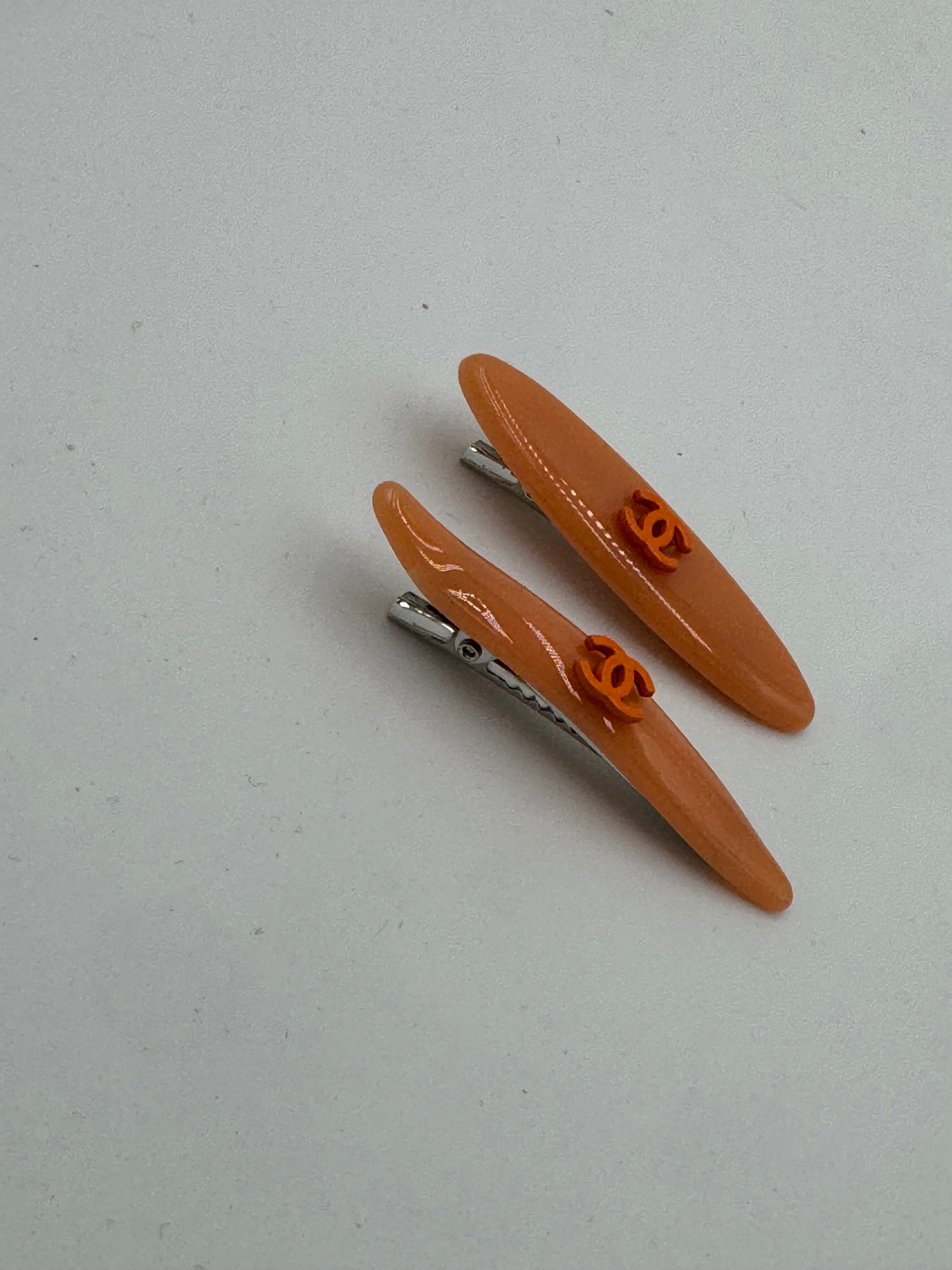 Coppia clip arancio