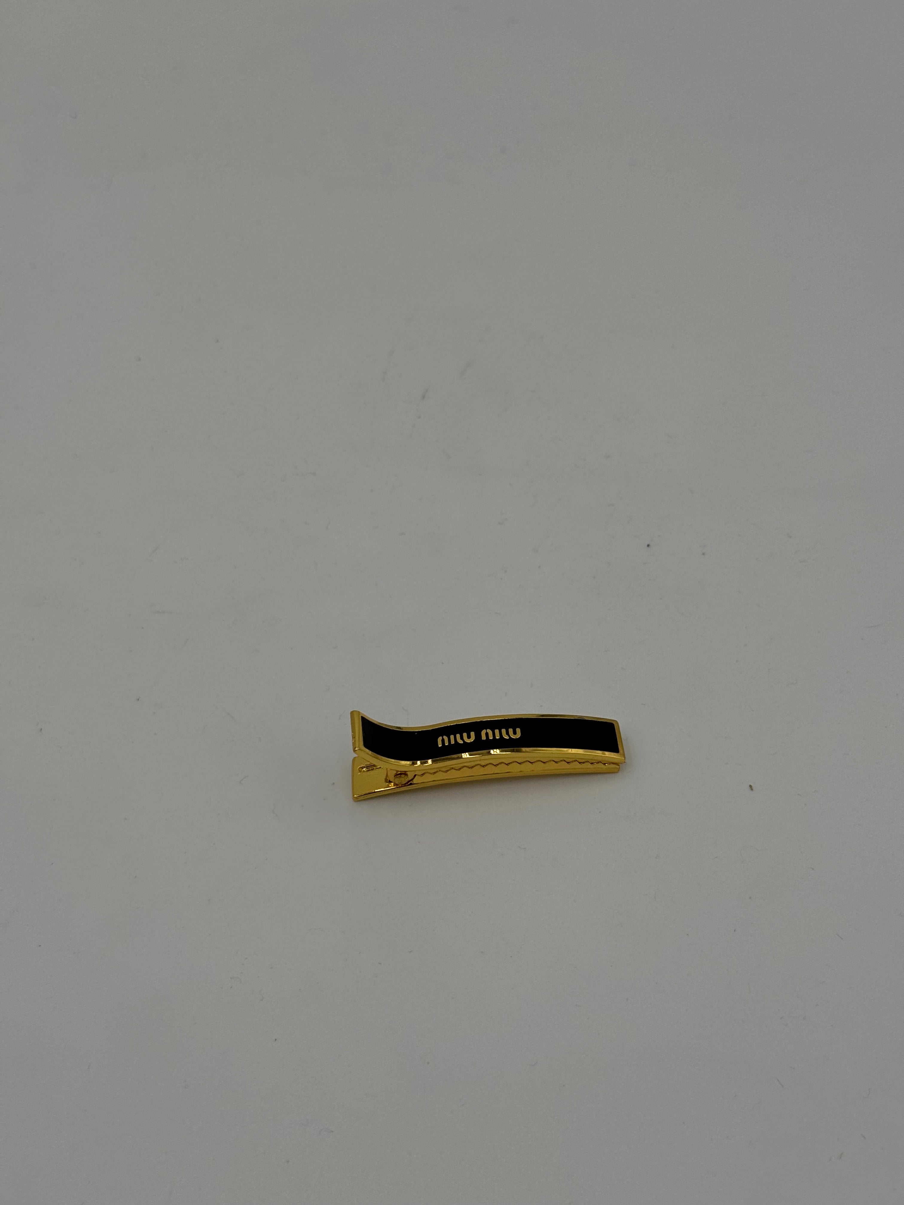 Clip Miller black