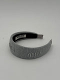 Cerchietto text grigio chiaro